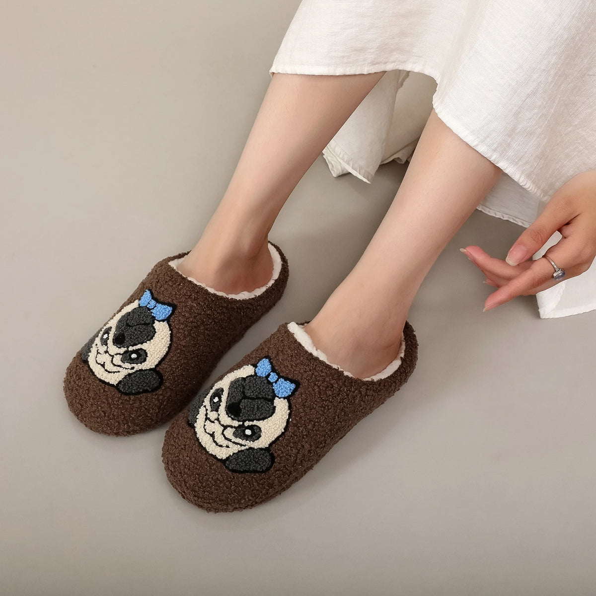 Chaussons bouclette à motifs