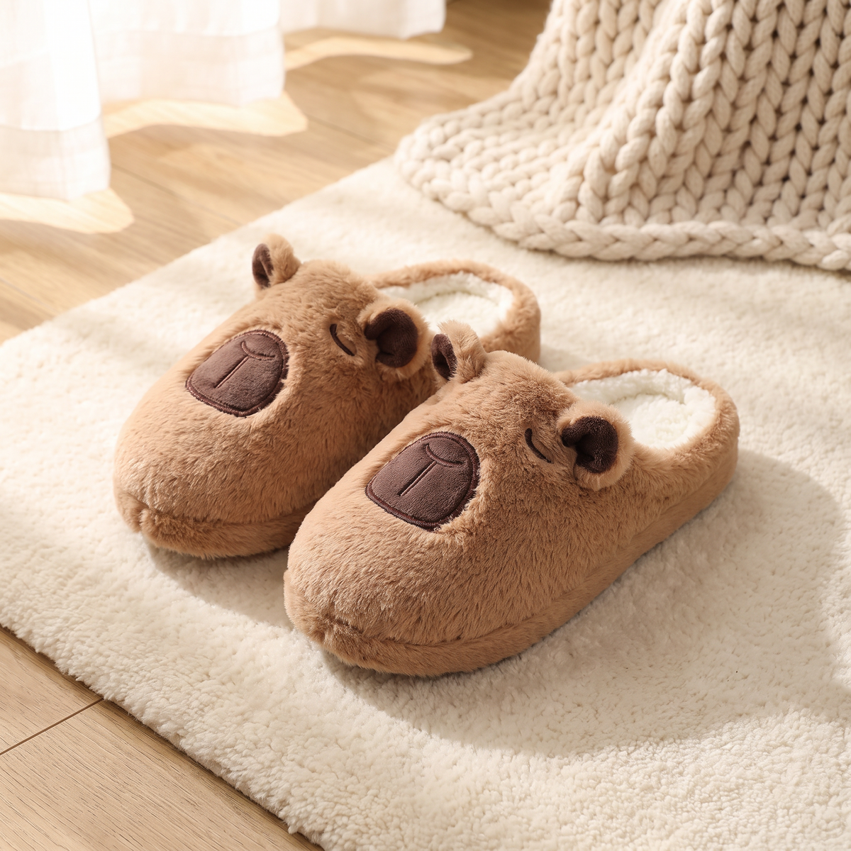 Chaussons posés sur un tapis en laine