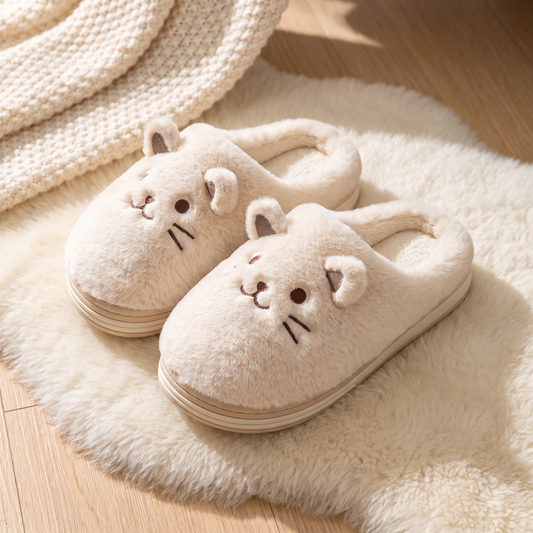 Chaussons posés sur un tapis en laine