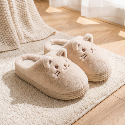 Chaussons posés sur un tapis en laine